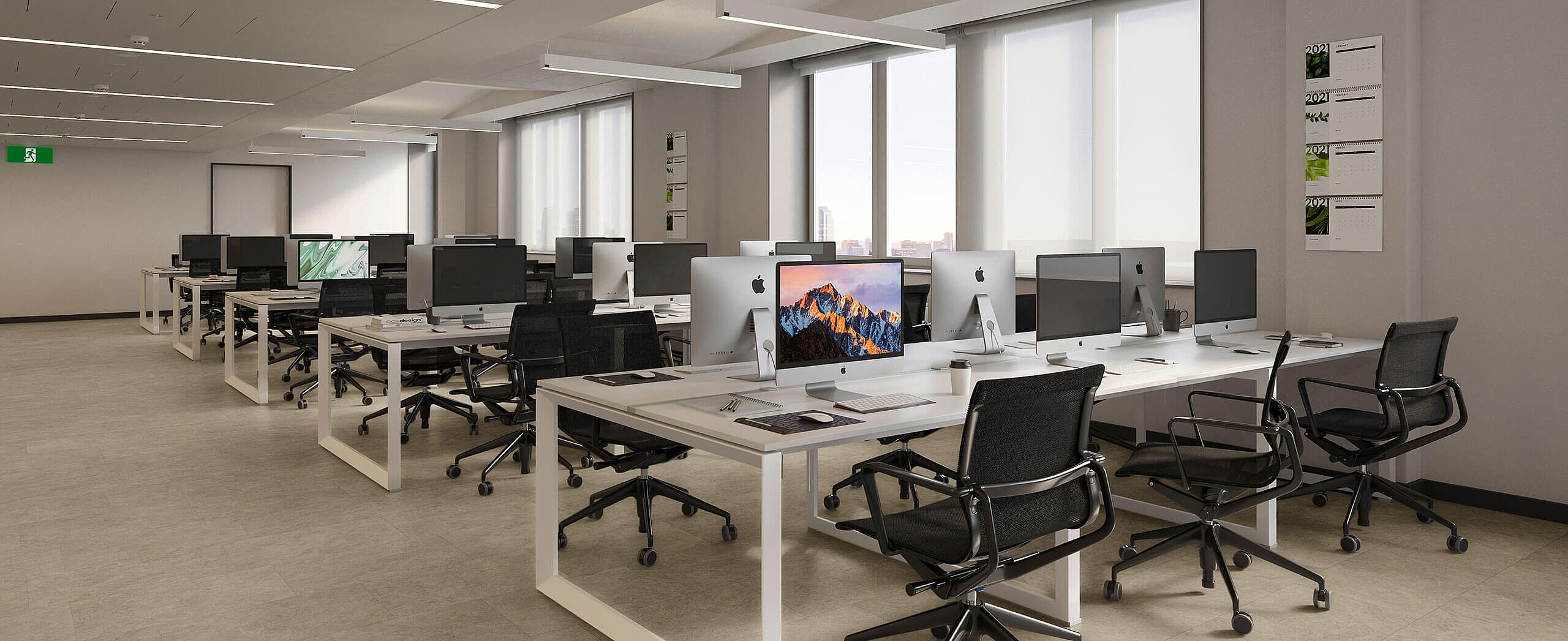 Modern open-plan office with recycled elastic flooring in a light mineral look.