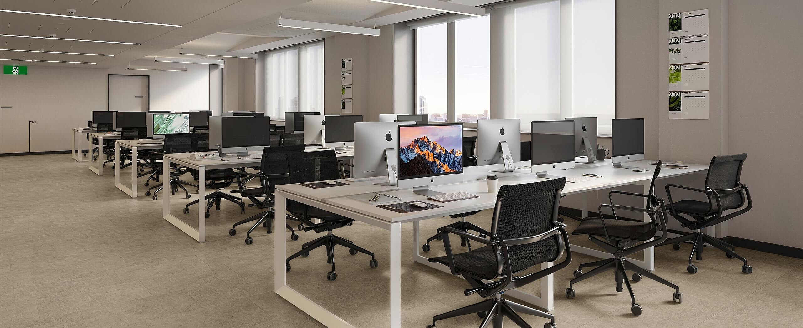Modern open-plan office with recycled elastic flooring in a light mineral look.