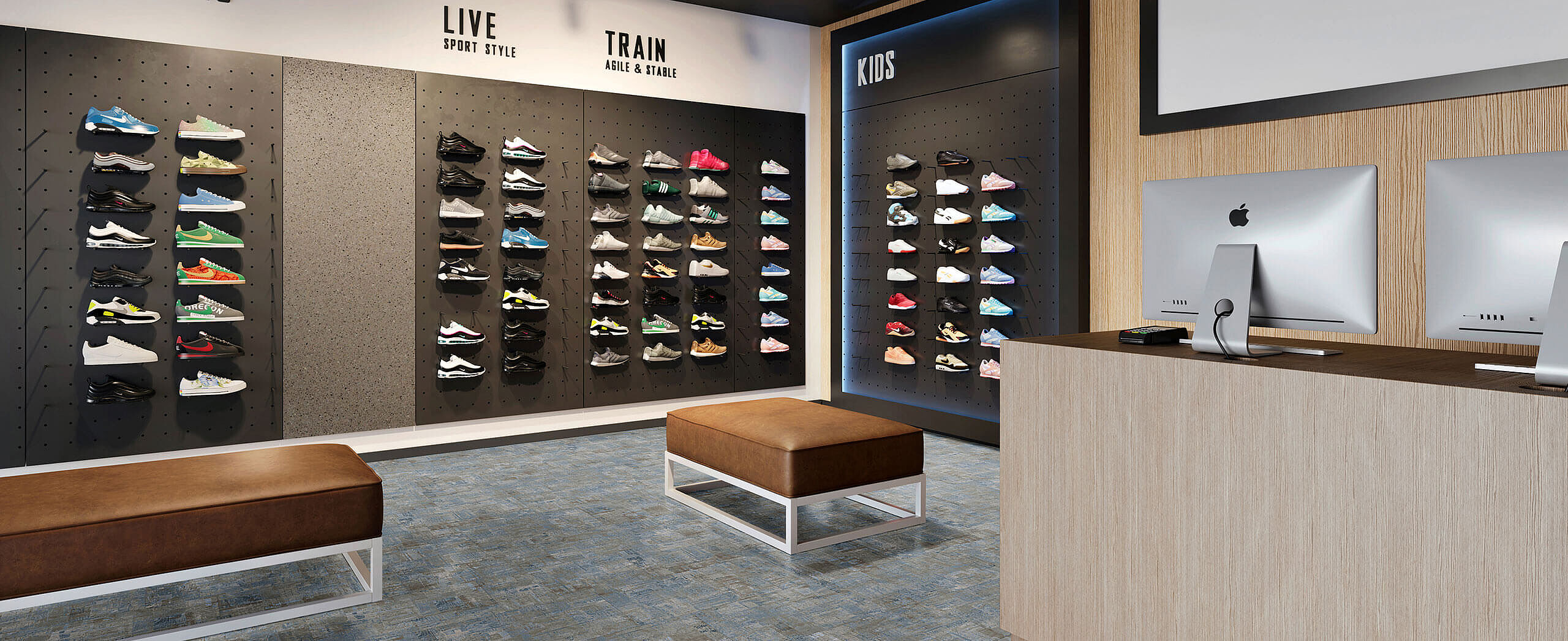 Recycled elastic flooring in a blue-grey stone look for retail spaces – durable, slip-resistant and easy to maintain. Modern sneaker store with shoe display wall and benches on recycled elastic flooring in a blue-grey stone look with a lively, mottled texture.