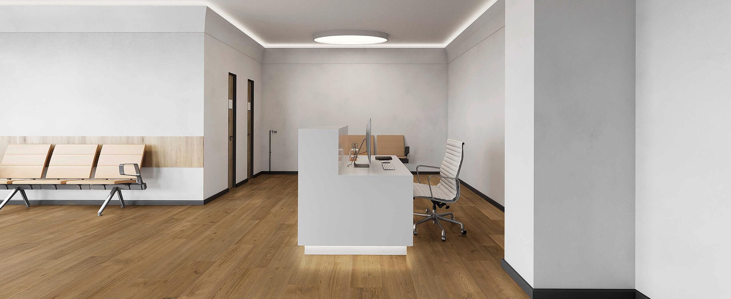 Modern reception area with recycled elastic flooring in warm wood-look.